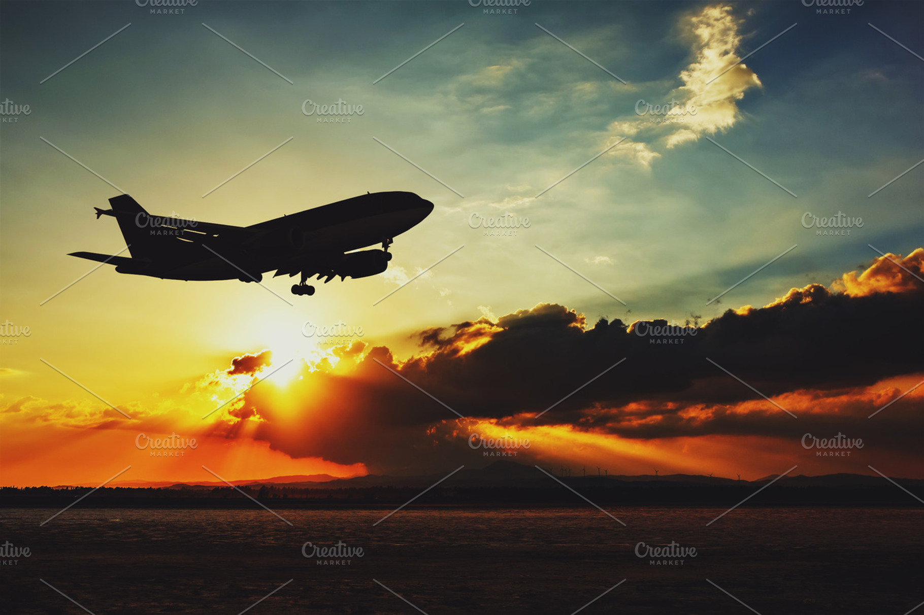 Silhouette of an airplane landing., a Transportation Photo by odpium