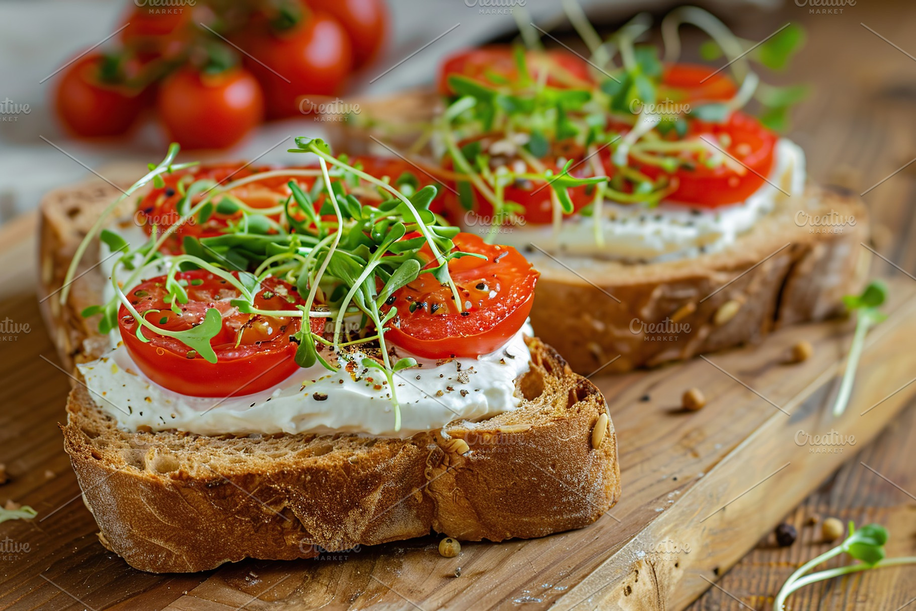 Sandwich with cream cheese, microgreens and tomatoes on wooden table, a Food & Drink Photo by AlyaAnd