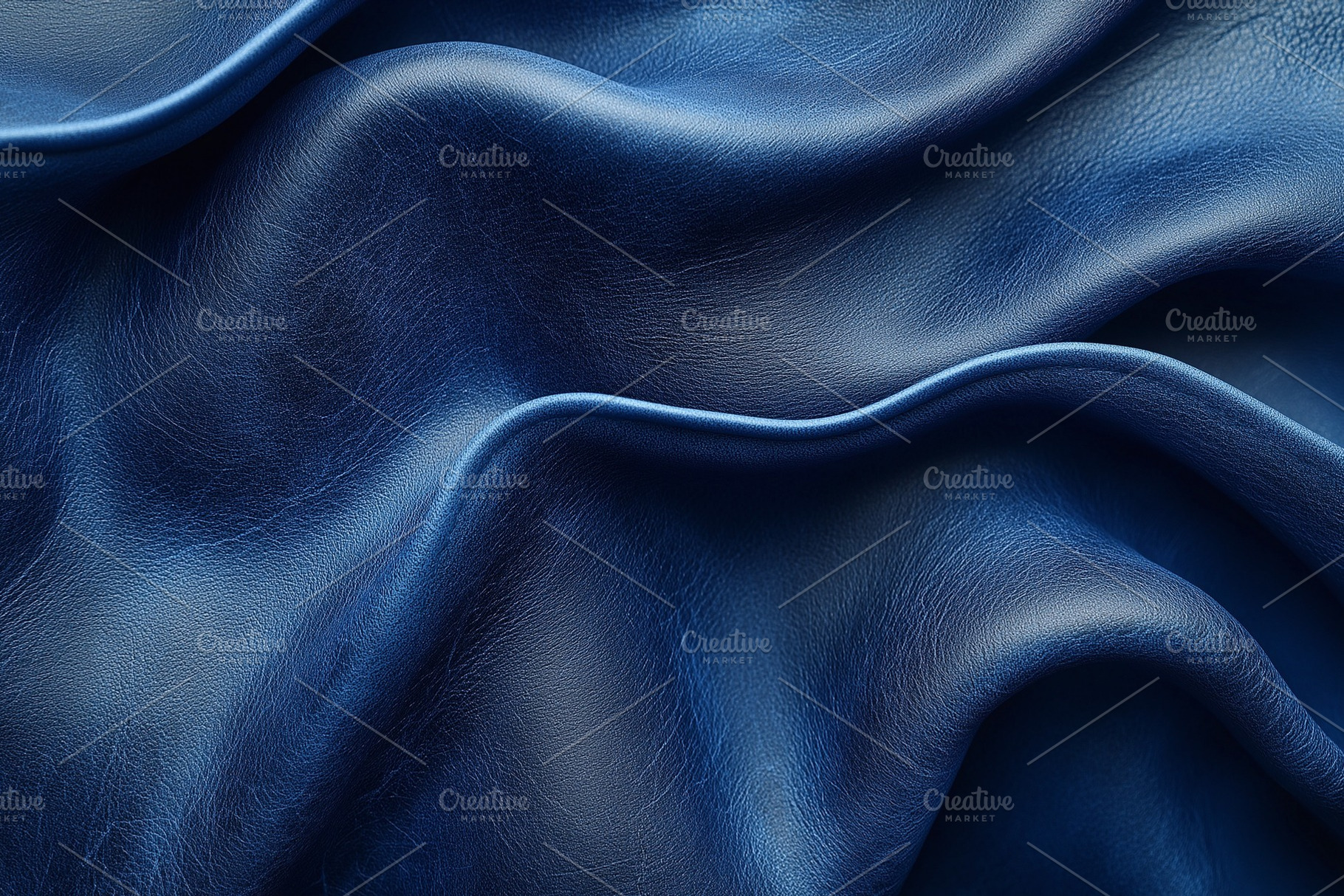 Close-up of rich navy blue leather texture, showcasing its smooth, soft surface, a Background Photo by ImageMir