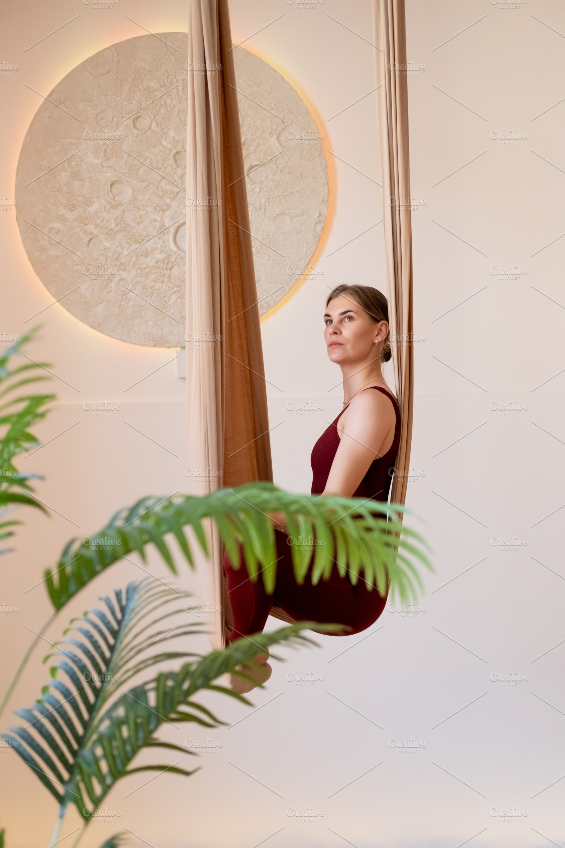 Aerial yoga pilates studio athletic woman hammock, a Person Photo by Photo Drive Studio