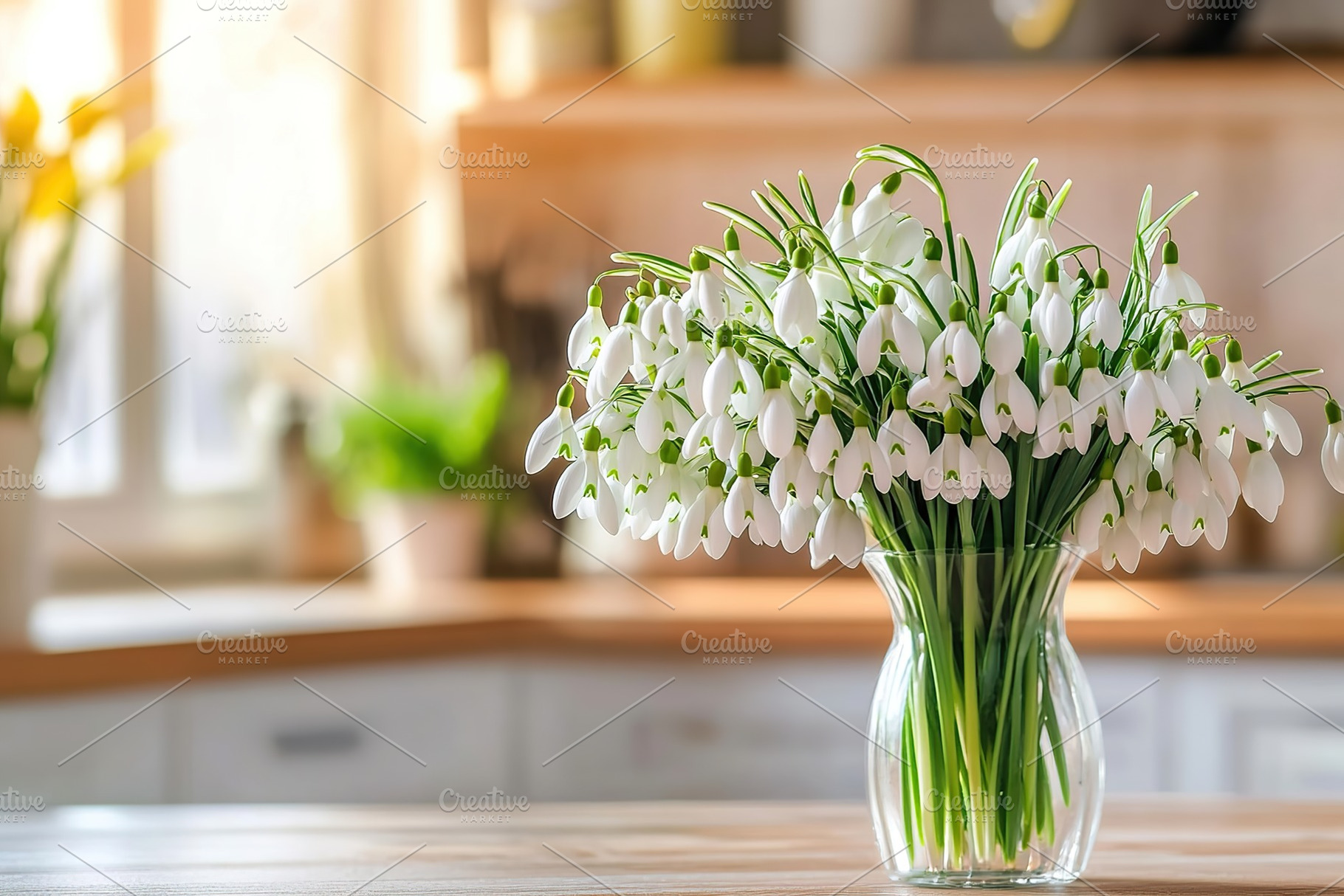 Bouquet of snowdrop flowers in vase on blurred kitchen background, a Nature Photo by AlyaAnd