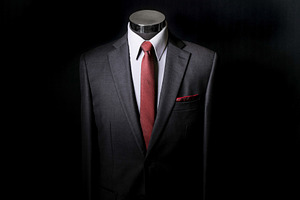 Elegant Black Suit with Red Tie
