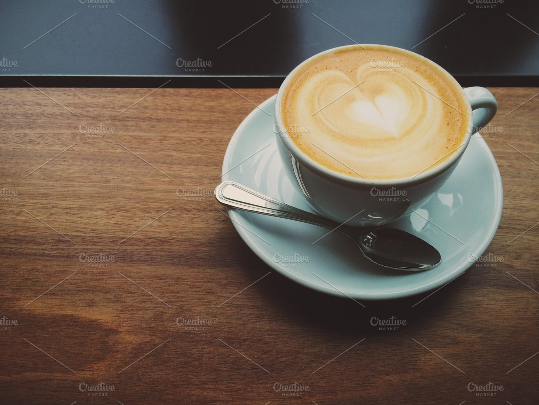 Cappuccino on Wooden Table