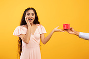 Presents delivery, holiday celebration concept. Hand holding and giving gift bo, a Photo by Prostock-Studio (Thumbnail 2 of 4)