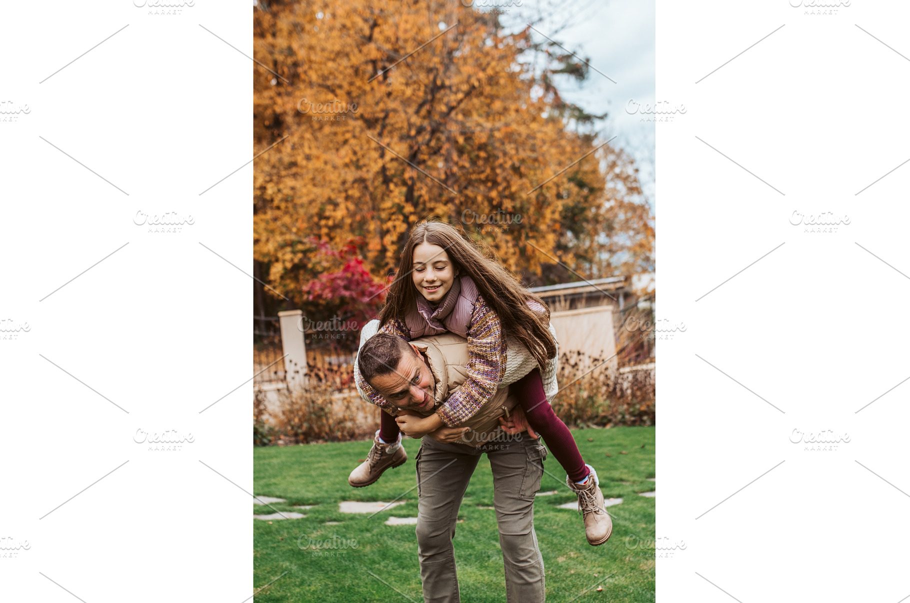 Father playing with daughter, a Person Photo by HalfPoint