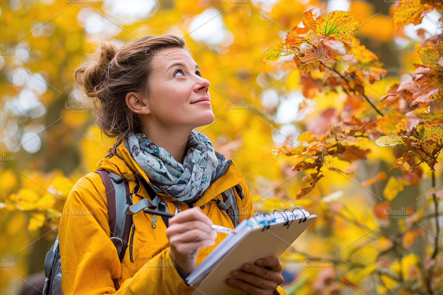Student creates vibrant artwork while painting outdoors in autumn woods, a Photo by AlyaAnd