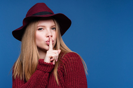 woman showing silence gesture, a Person Photo by Elena Vagengeim