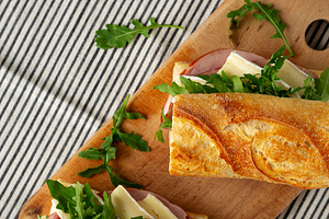Homemade French Ham and Brie Baguette with Arugula Greens, top v, a Food & Drink Photo by LiudmylaChuhunova