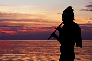 Yoga playing fluite, a Photo by saiko3p
