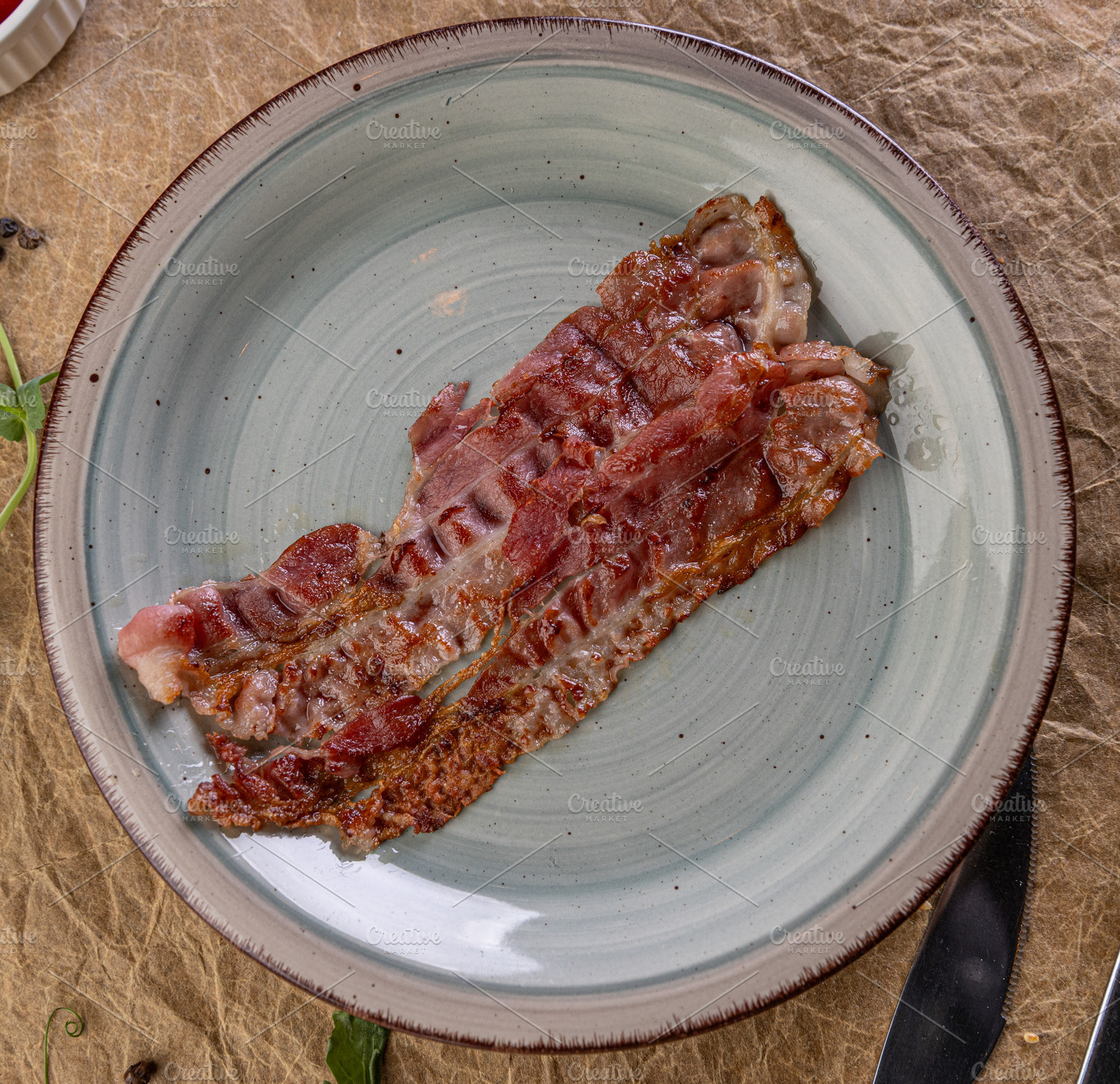 Fried bacon piece for breakfast, a Photo by Grafvision photography