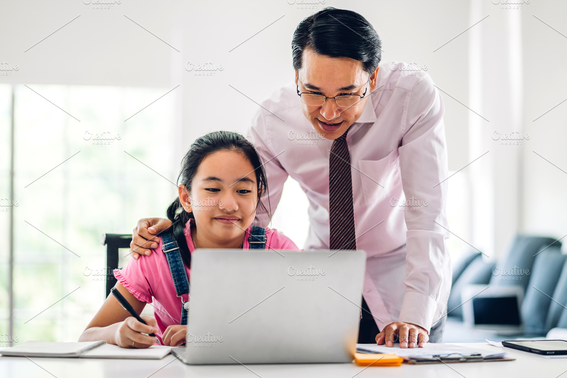 Father and asian kid little girl learning and looking at laptop, a Person Photo by Art_Photo