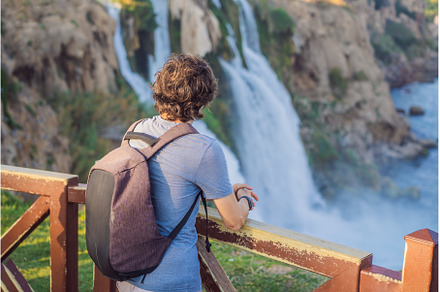 Man tourist on the background of, a Nature Photo by Elizaveta Galitskaya