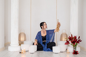 Singing bowls sound meditation woman chime healing, a Person Photo by Photo Drive Studio