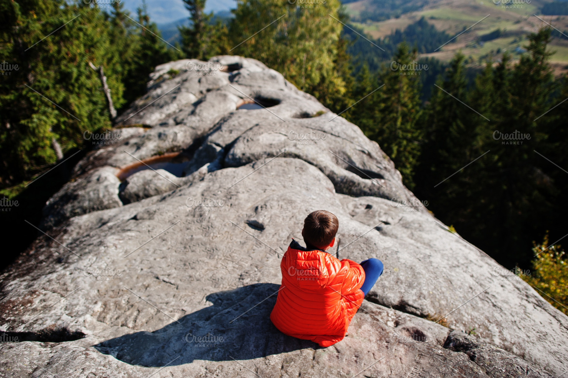 Boy on top of mountain. Children hiking on beautiful day in moun, a Nature Photo by AS photostudio
