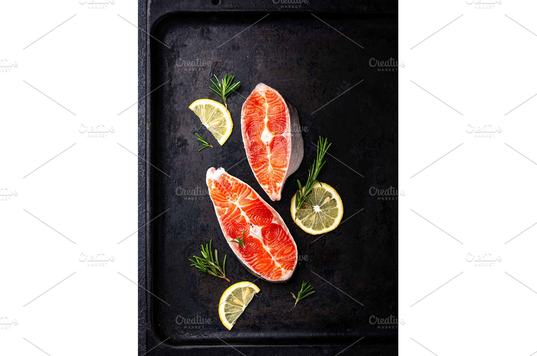 Raw uncooked salmon with rosemary, a Food & Drink Photo by Yulia Furman