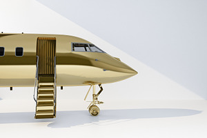 golden private jet with open stair