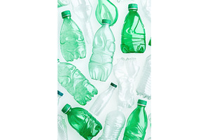 Green and clear plastic bottles, an Industrial Photo by Lermont51