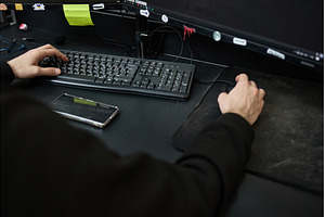 Person working on computer with, a Technology Photo by wip3out