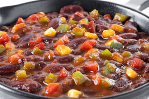 Mexican chilli beans with vegetables in iron pan, a Food & Drink Photo by etorres69