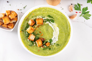 Tasty vegan zucchini cream soup with hard cream and croutons, a Food & Drink Photo by Rimma