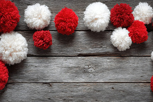 Colorful pom poms made of yarn, a Photo by Pavel_design