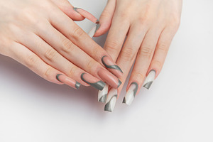 Woman's hands showing creative nail art design, a Beauty & Fashion Photo by Olena Rudo