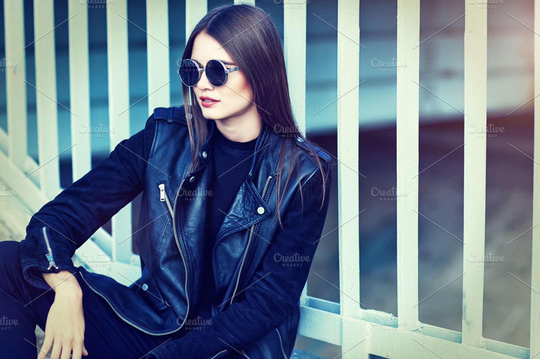 Young woman in sunglasses outdoor stock photo containing sunglasses and woman, a Beauty & Fashion Photo by MaxFrost