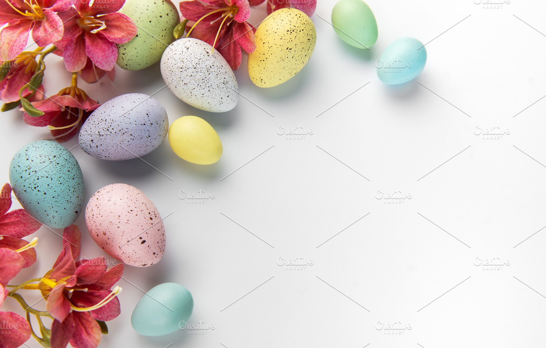 Colorful easter eggs and spring flowers border, a Holiday Photo by Olena Rudo