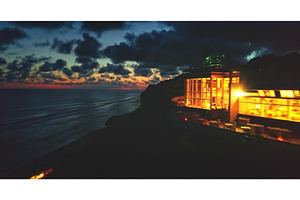 Luxurious cliffside resort glowing
