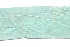 Mint crumpled paper strip isolated on white, a Background Photo by GoodGoods