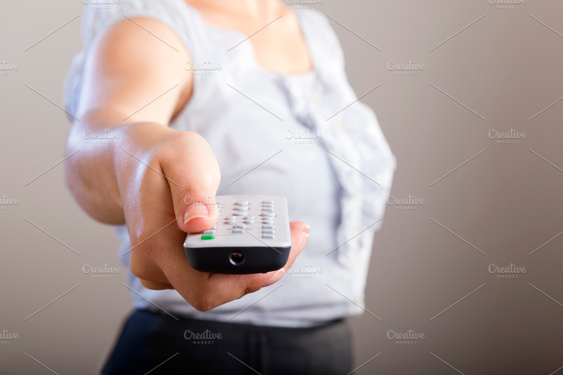 Woman With Remote Control, a Background Photo by THP Creative