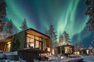 Northern lights above glass cabins, a Photo by Beautiful things