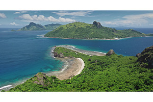 Aerial view of tropical Kuata Island, a Nature Photo by Goinyk