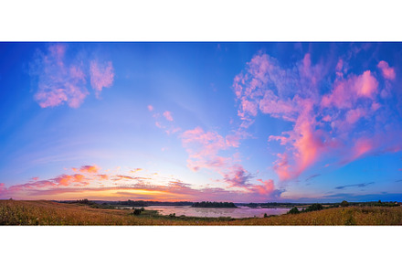 Beautiful sunset over a lake in, a Nature Photo by sborisov