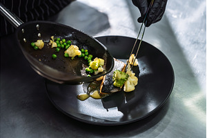 Professional chef plating grilled, a Food & Drink Photo by Red Hot Chili Pepper Shop