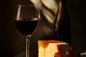 Savoring red wine and cheese with grapes, creating a delicious still life in dr, a Food & Drink Photo by Studio ANNA