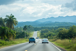 Cars travel along a national road su, a Photo by Iftikhar Alam