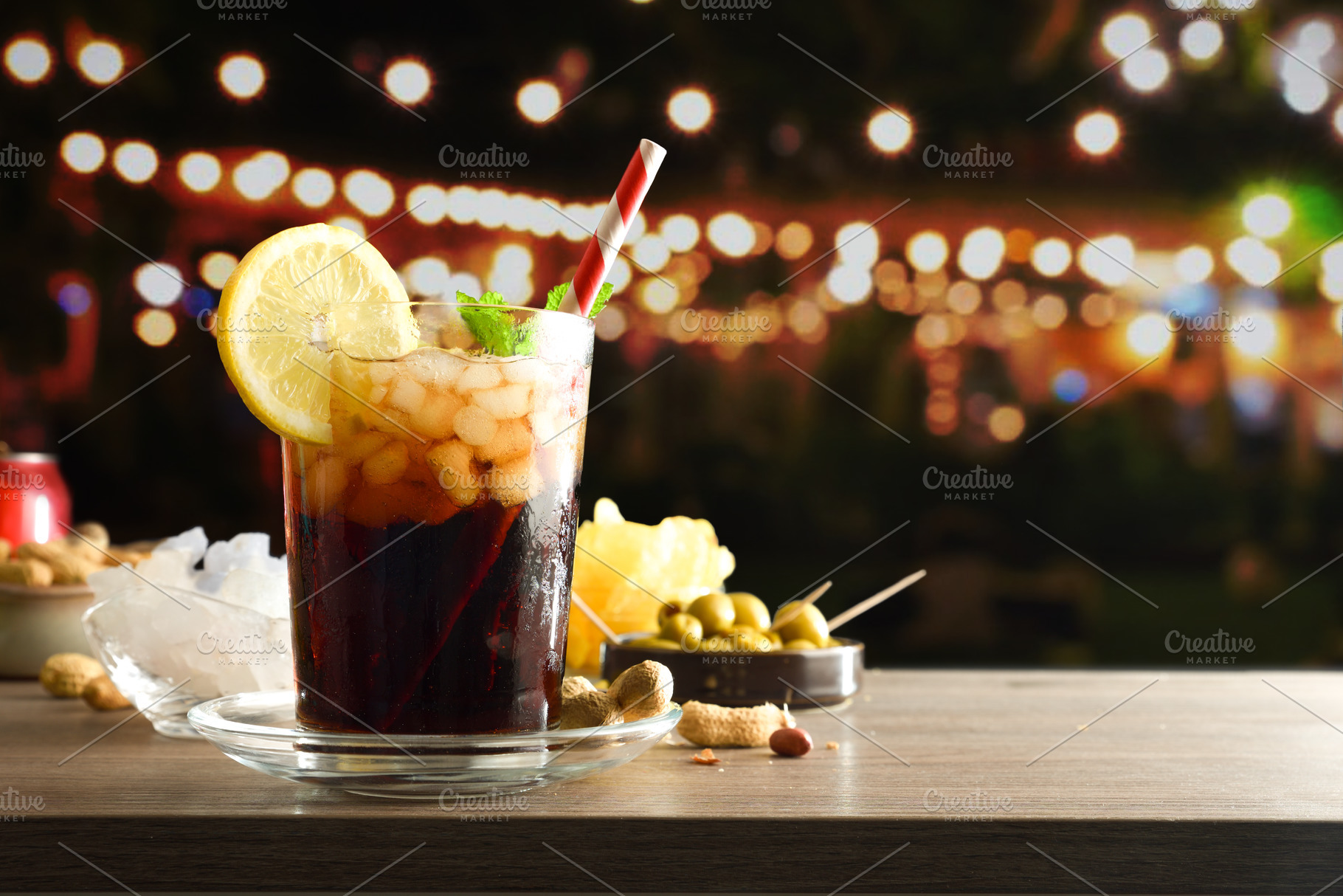 Table with drinks and snacks in a festive evening atmosphere, a Food & Drink Photo by Davizro's Market