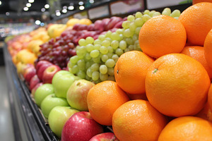Colorful fresh fruits display in supermarket, a Food & Drink Photo by AlyaAnd