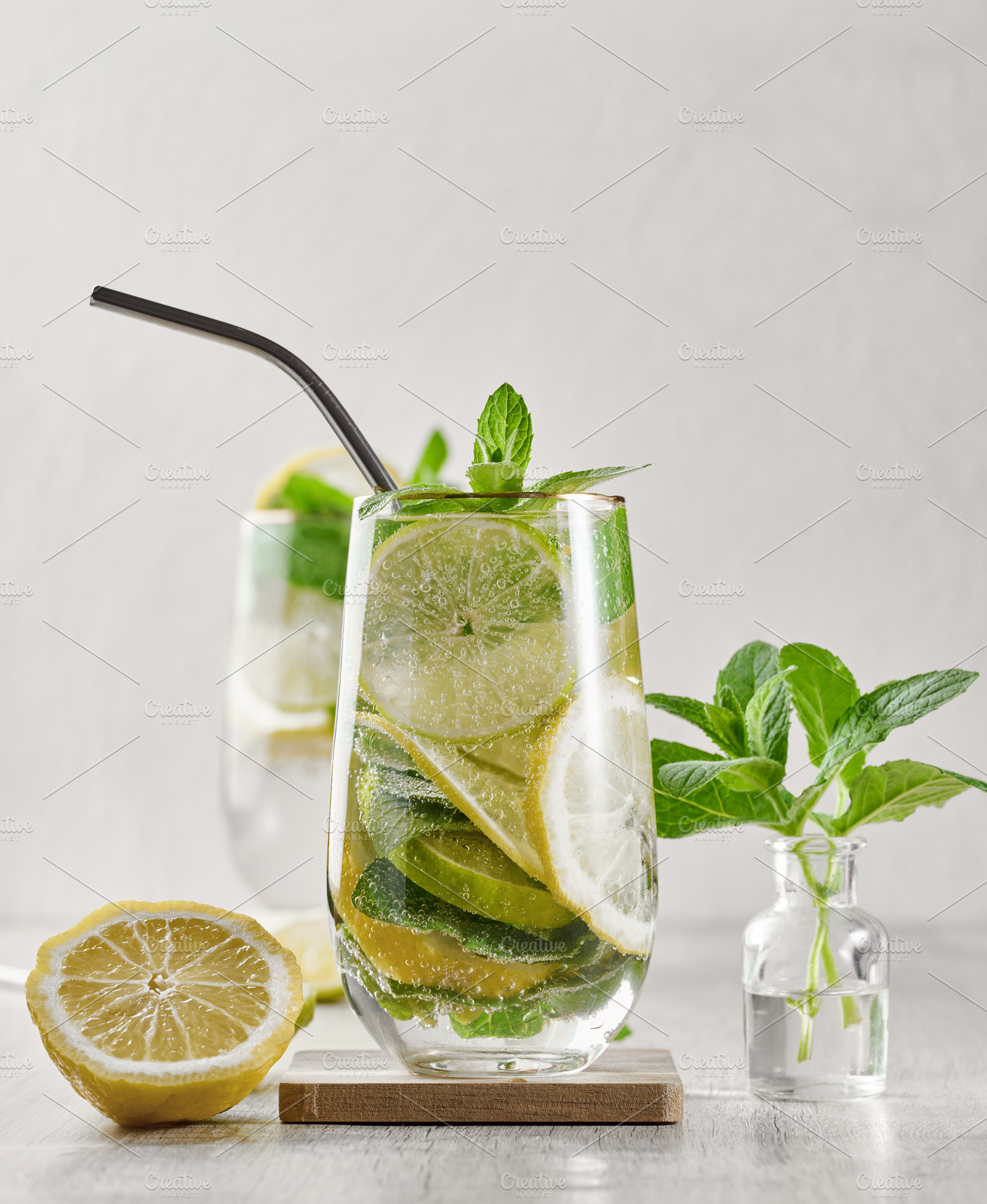 Summer drink with lime and mint. Cold drink, non-alcoholic mojit, a Food & Drink Photo by ndanko