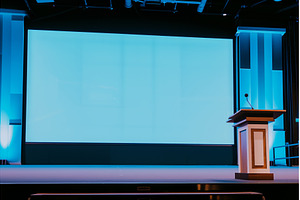large screen behind an empty, a Background Photo by Sergey Kotenev