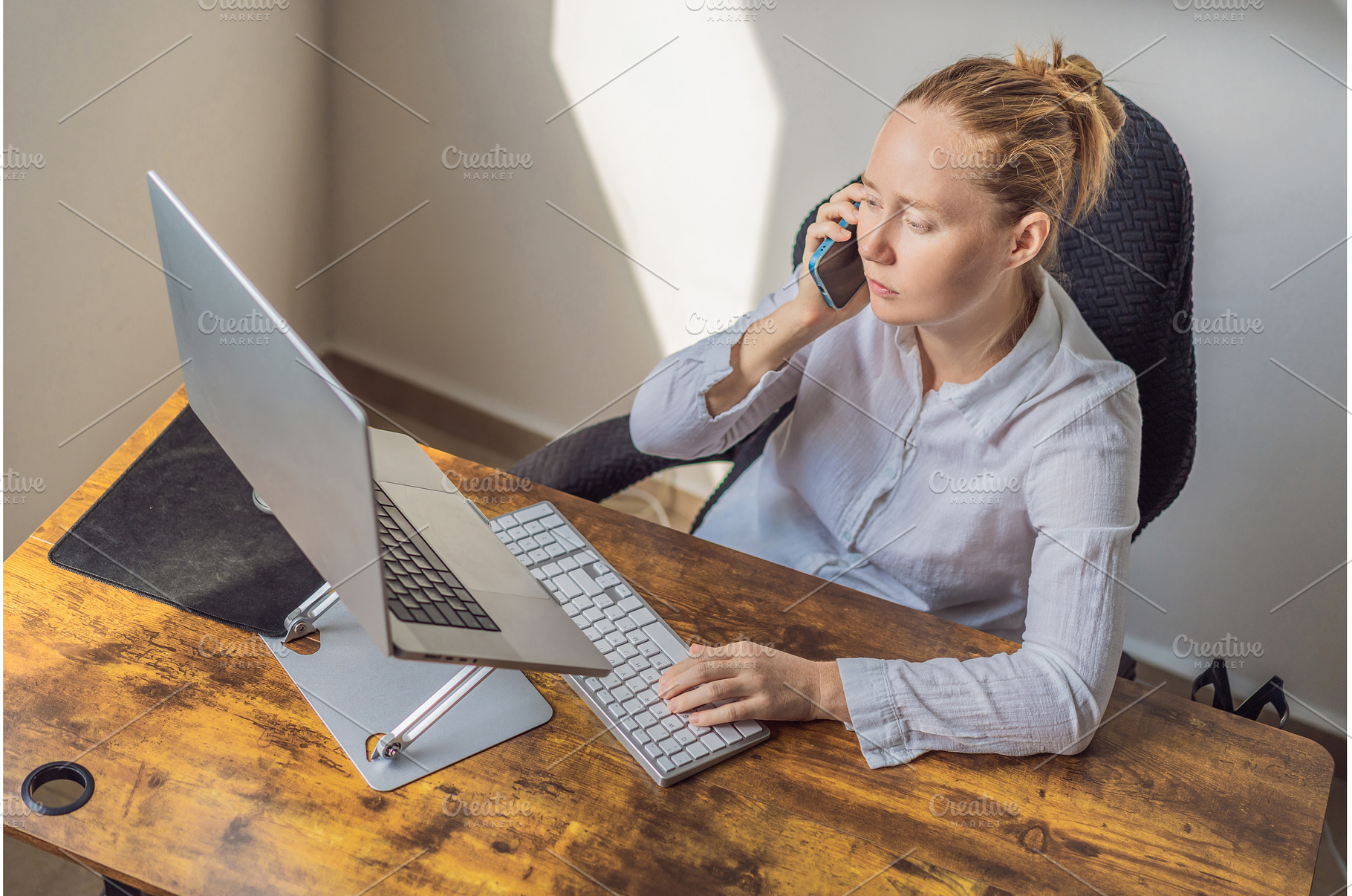 Woman working in her home office, a Technology Photo by Elizaveta Galitskaya