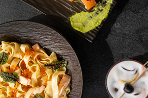 Cafeteria lunch menu mix sushi roll pasta cocktail, a Food & Drink Photo by Photo Drive Studio