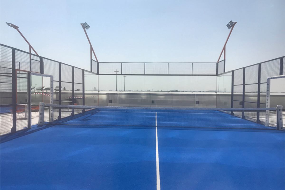 Tennis padel court blue grass turf, a Photo by Logoworks (Photo 1 of 2)