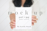 Girl holding an invitation mockup, a Print Template by My Lovely Stock (Thumbnail 1 of 3)