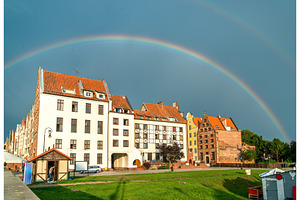 Rainbow above elblag town in poland containing elblag, poland, and rainbow, an Architecture Photo by Leonid Andronov