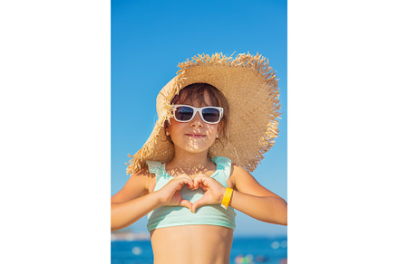A child at the sea is a girl, a Person Photo by yanadjana