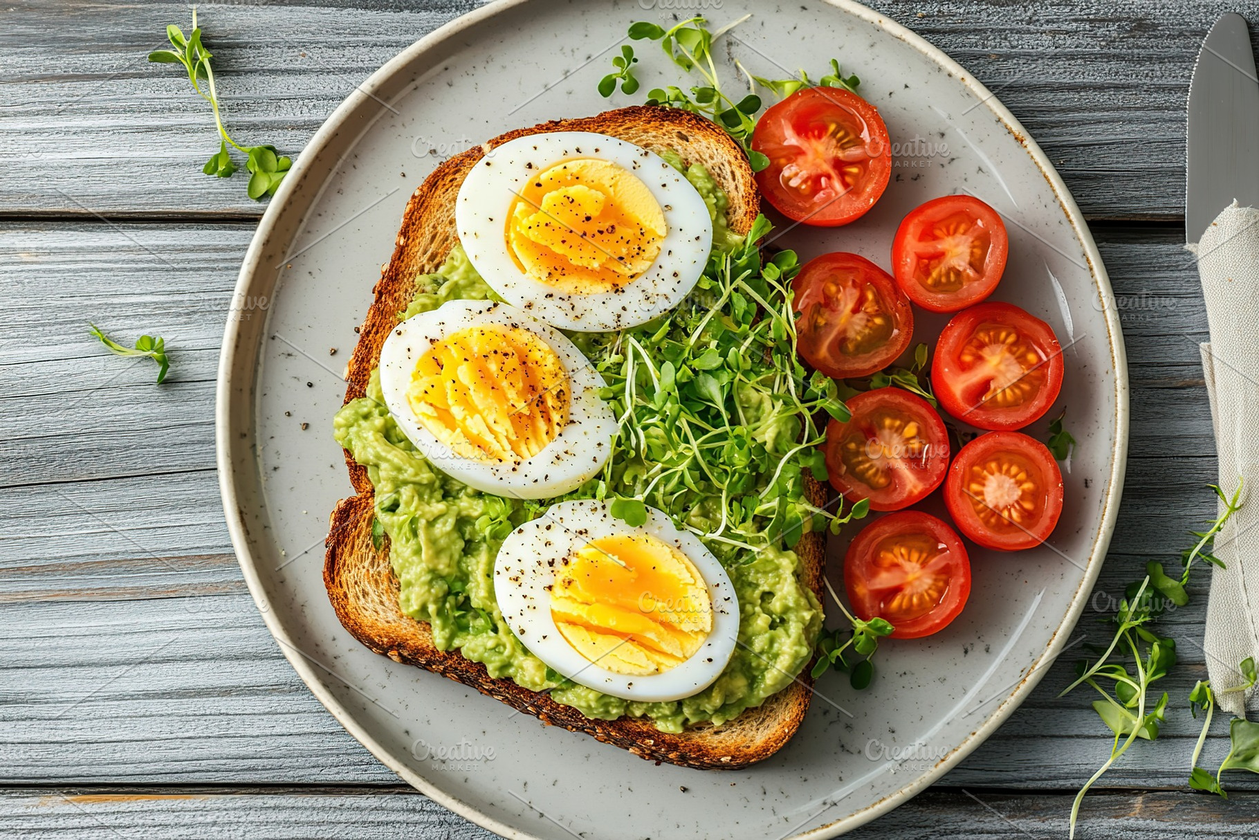 Delicious toast bread with avocado, boiled egg, tomatoes and microgreen, a Food & Drink Photo by AlyaAnd