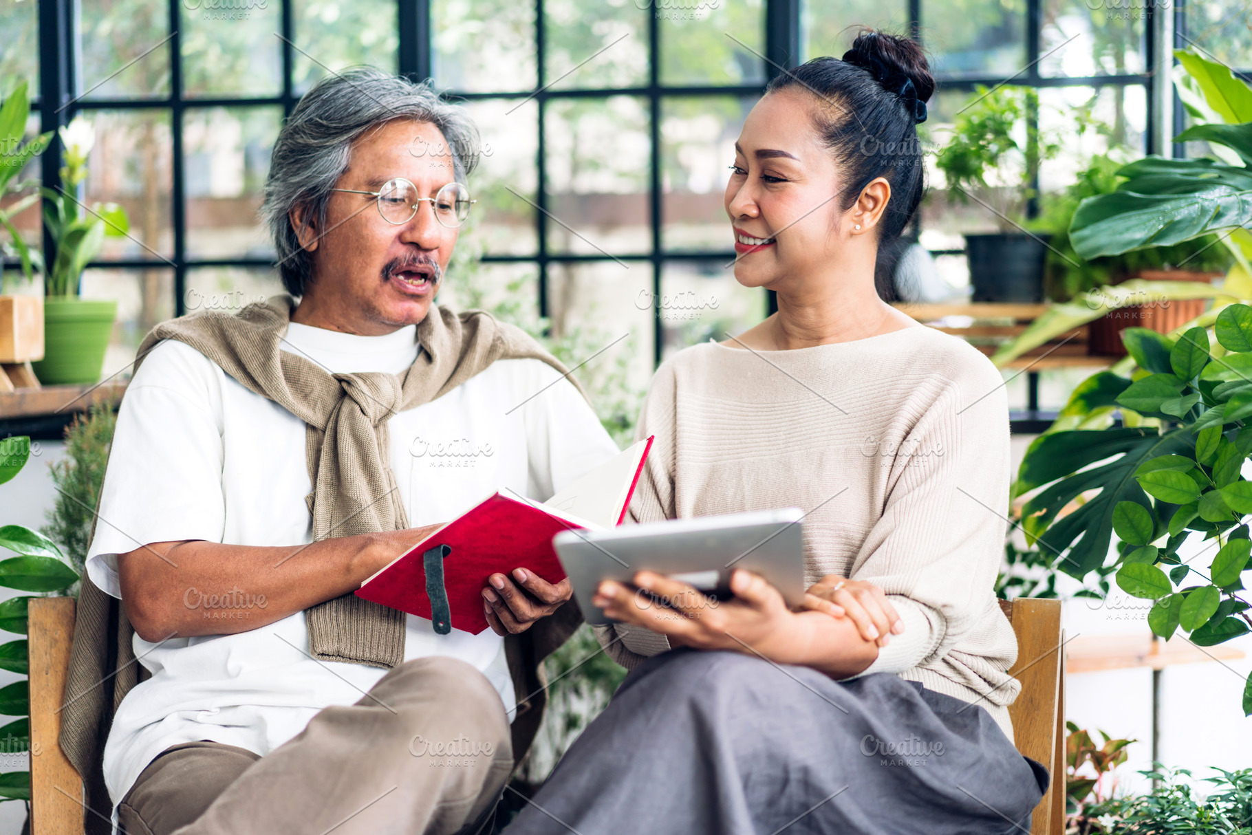 Senior couple asian family having good time using tablet compute, a Person Photo by Art_Photo