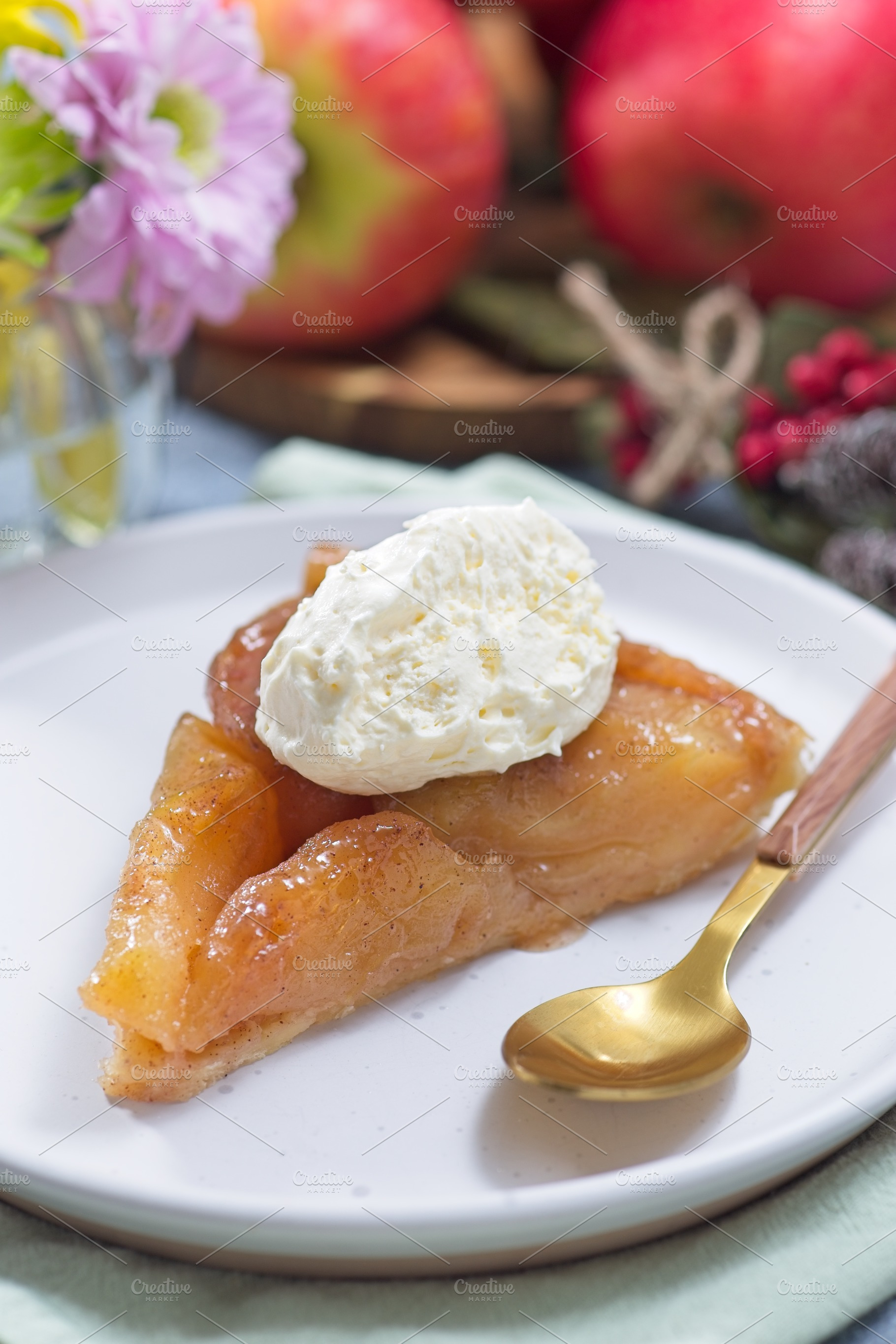 Slice of apple Tart Tartin with whipped cream, french upside down cake, vertica, a Food & Drink Photo by iuliia_n